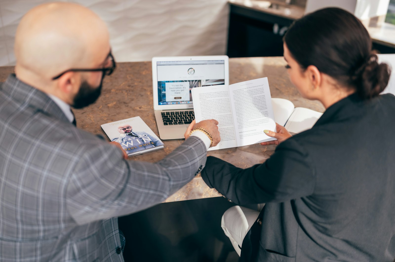 adviser reviewing commission and loan terms