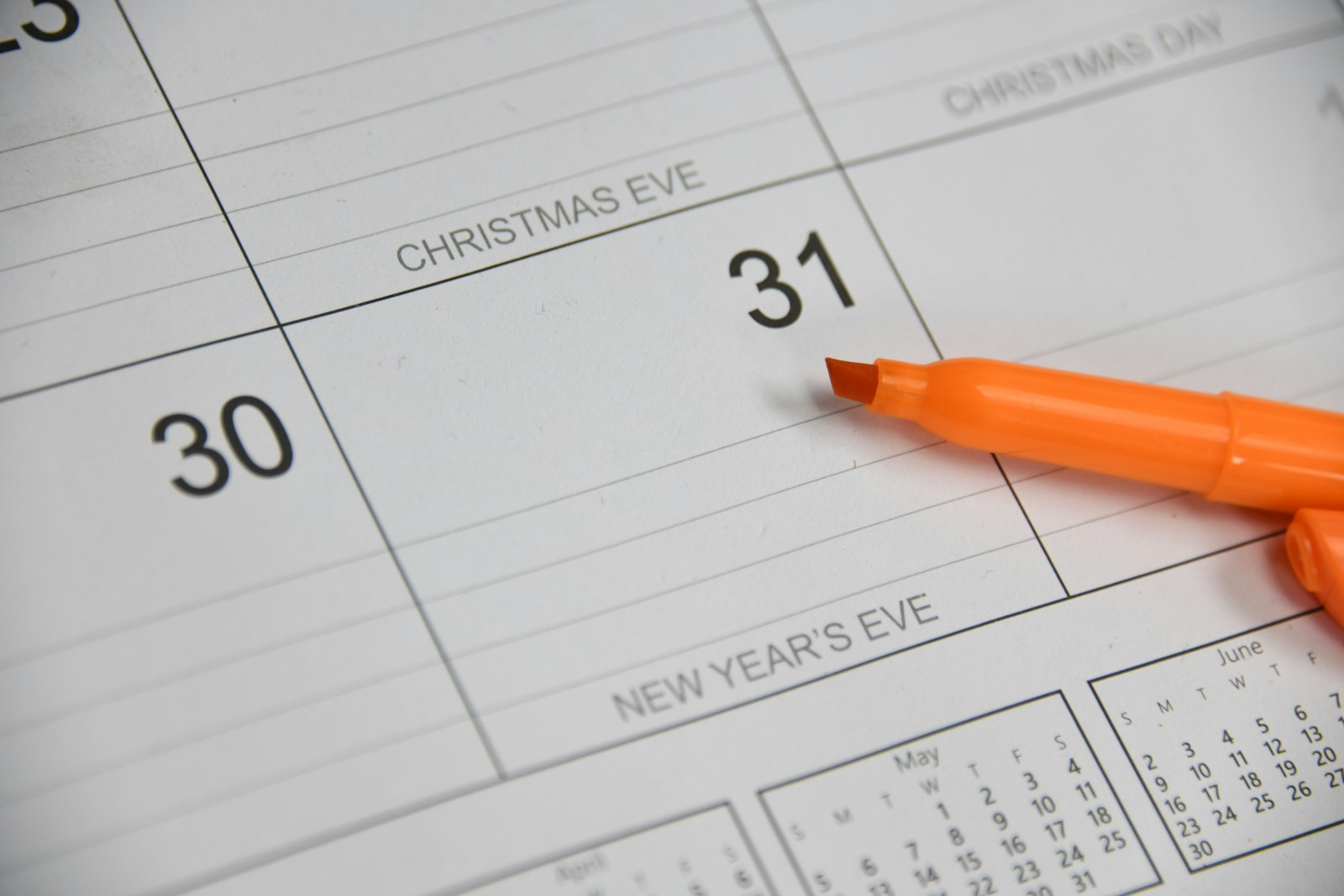 a marker resting on a calendar