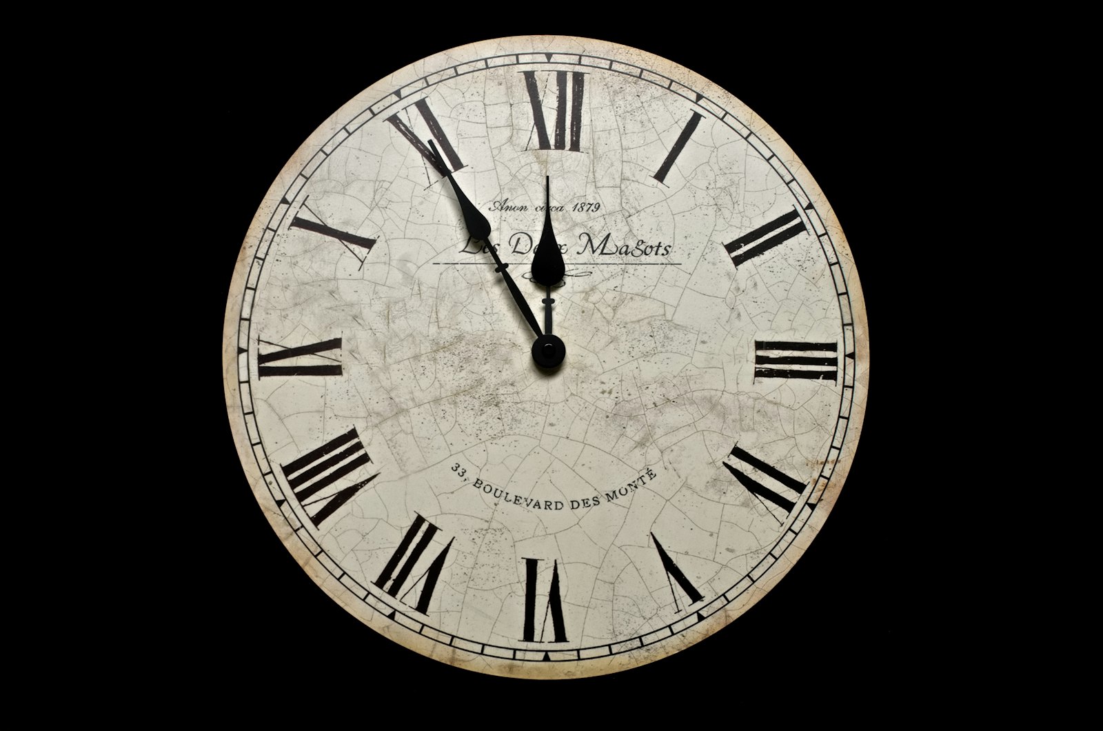 a white and black analog clock