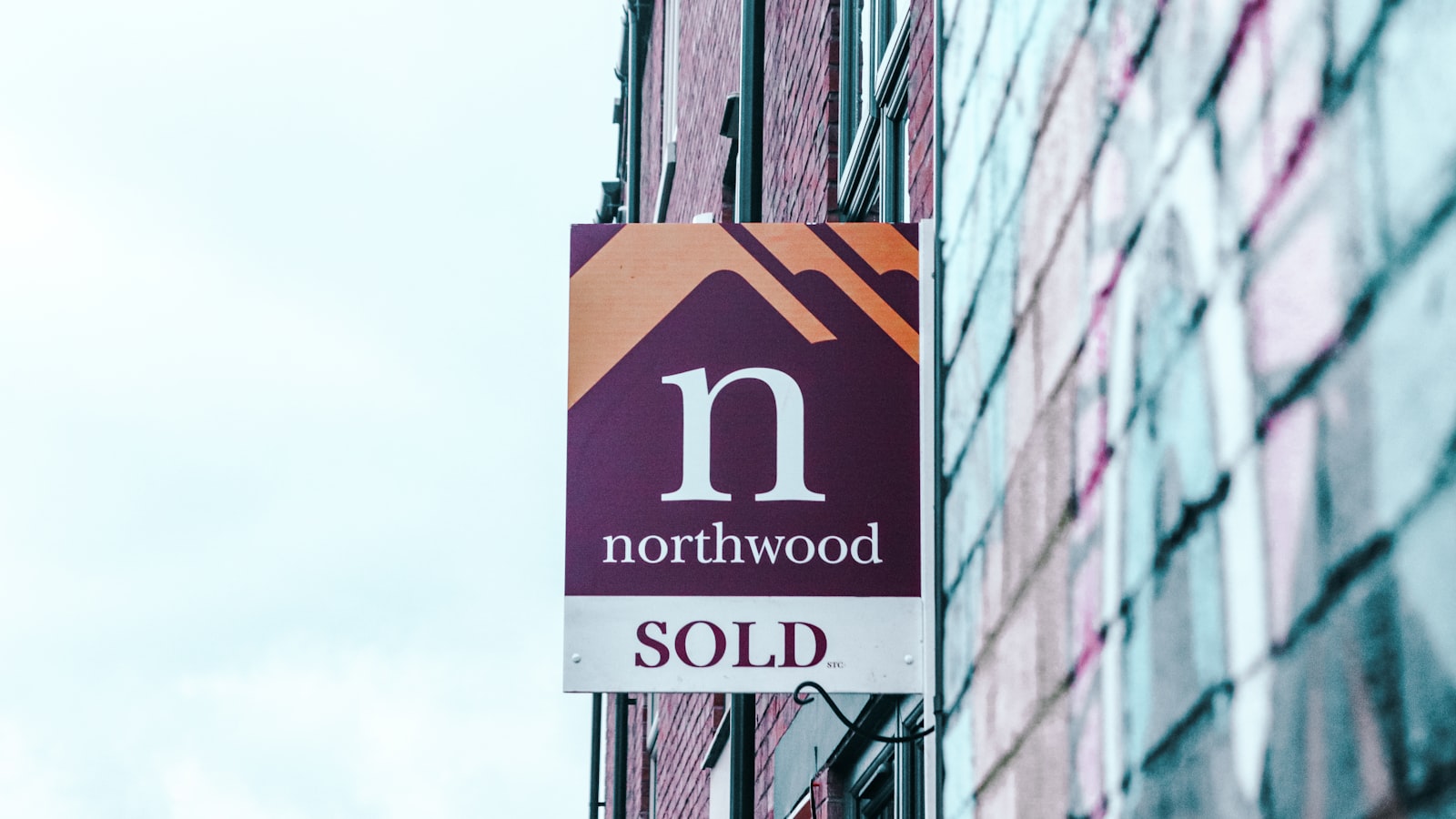 a for sale sign outside a New Zealand property