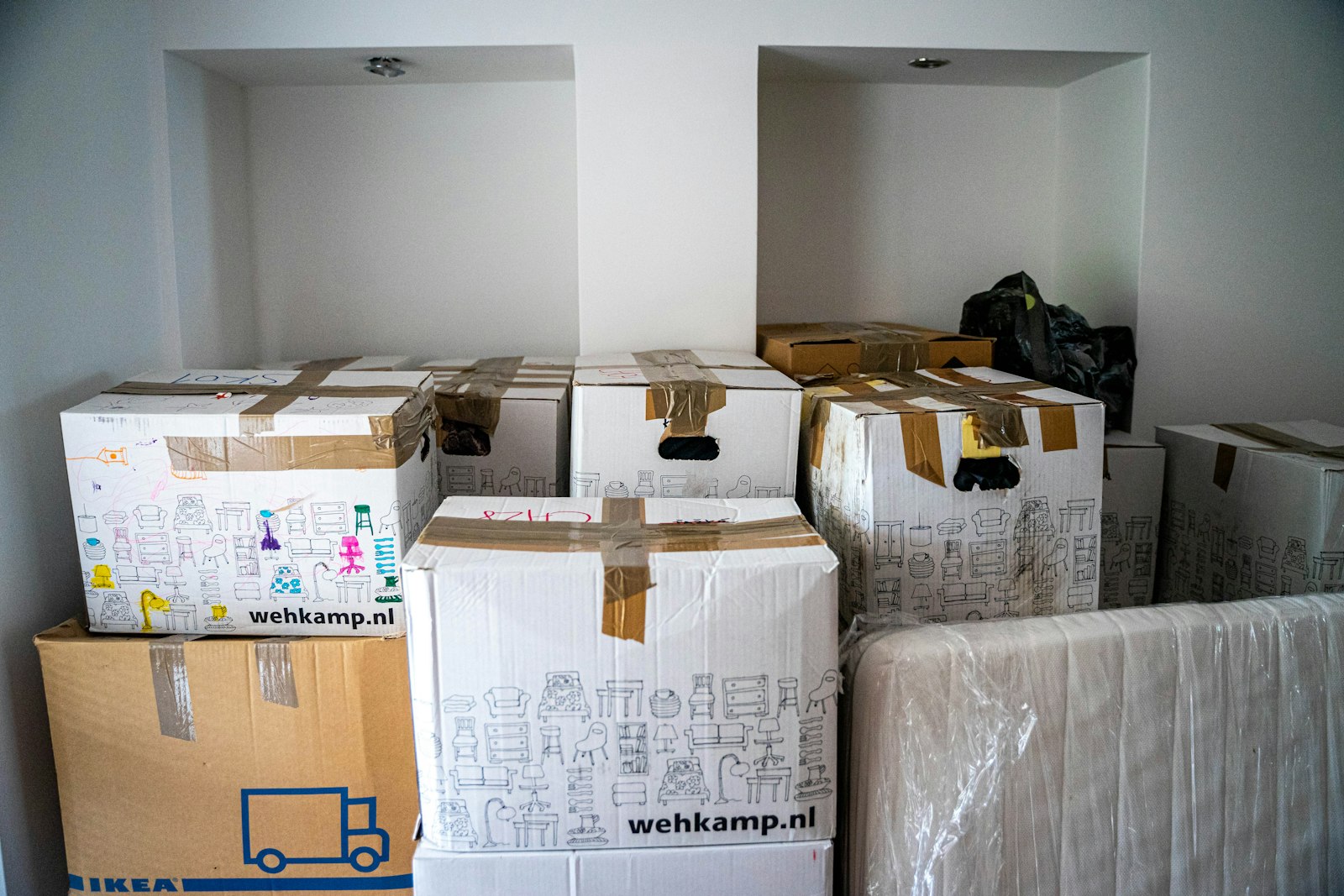 brown cardboard boxes on a wooden table
